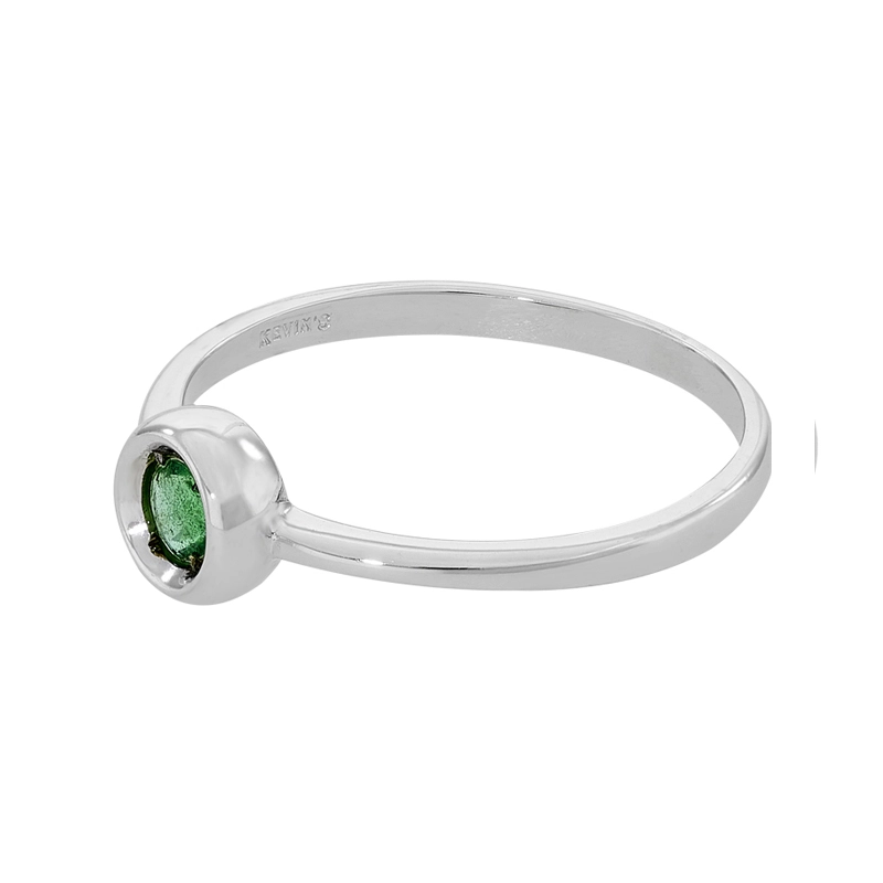 Anillo en oro blanco de 18 Kilates, con esmeralda central de 0.18 Ct