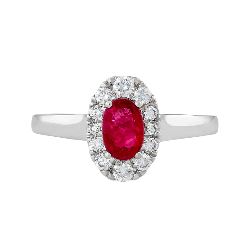 Anillo en oro blanco de 18 Kilates, con rubí central de 0.51 Ct y decoración en diamantes de 0.21 Ct