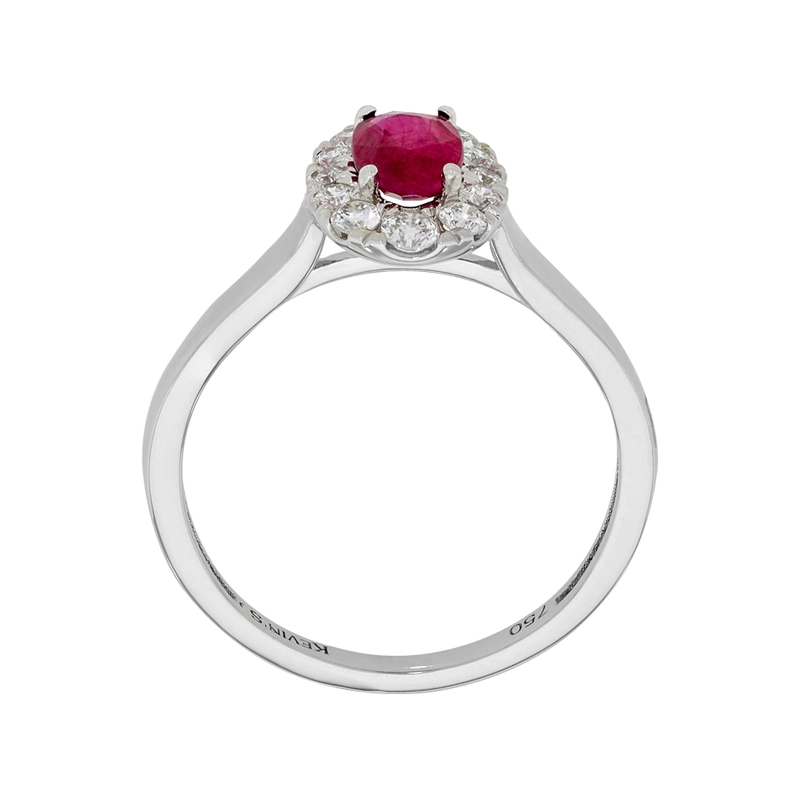 Anillo en oro blanco de 18 Kilates, con rubí central de 0.51 Ct y decoración en diamantes de 0.21 Ct
