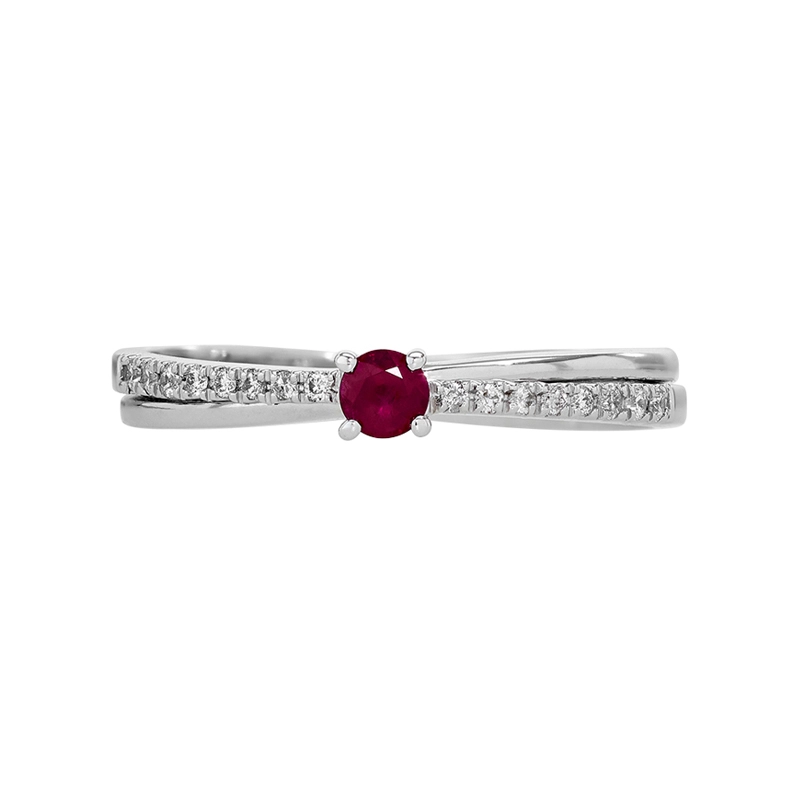 Anillo en oro blanco de 18 Kilates, con rubí central de 0.13 Ct y decoración en diamantes de 0.11 Ct
