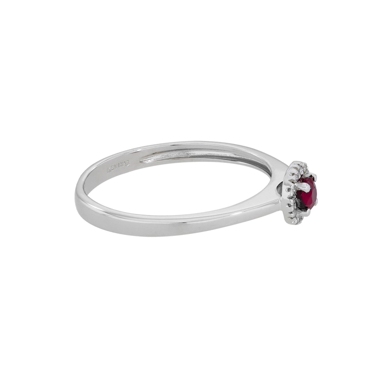 Anillo en oro blanco de 18 Kilates, con rubí central de 0.23 Ct y decoración en diamantes de 0.06 Ct