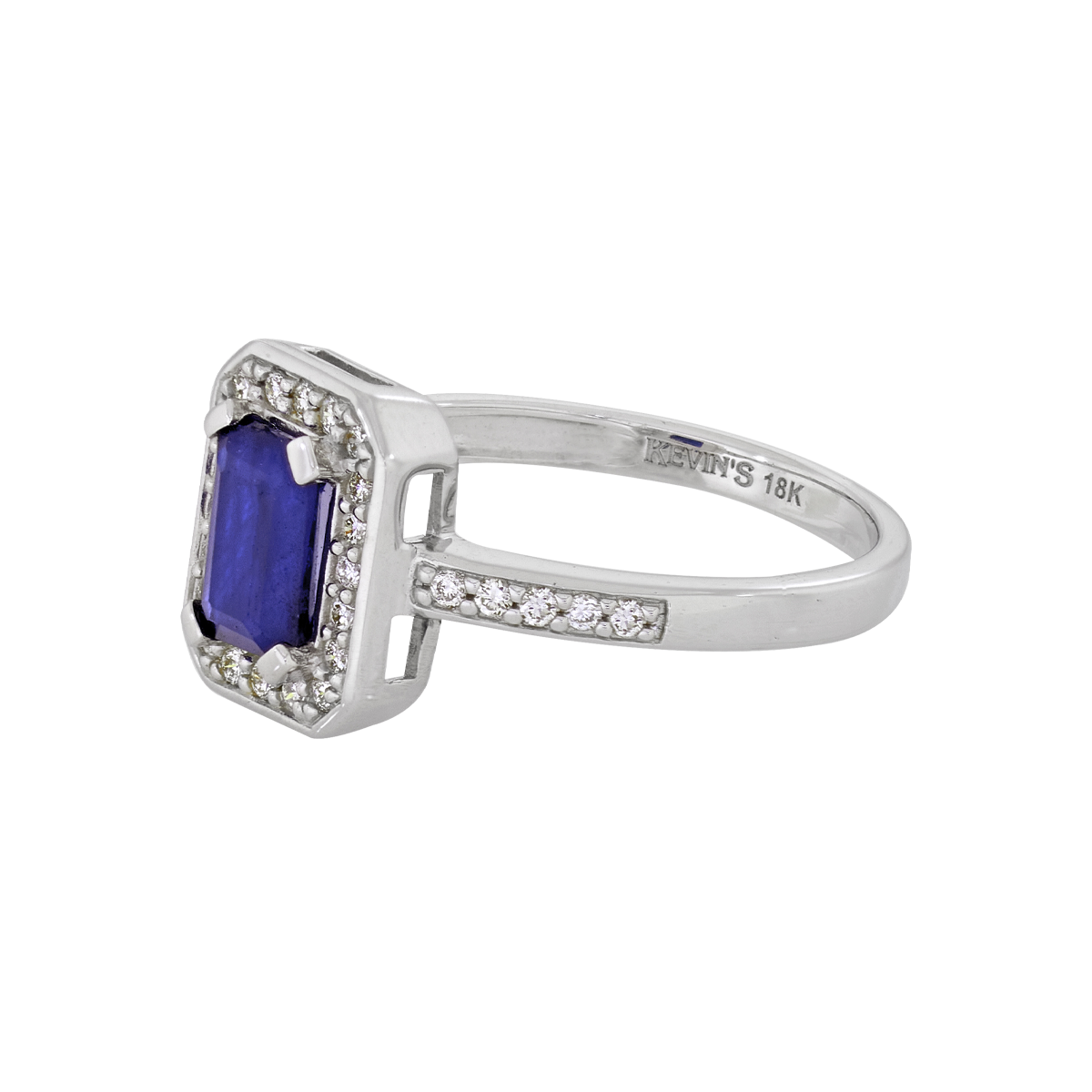 Anillo en oro blanco de 18 Kilates, con zafiro central de 0.60 Ct y decoración en diamantes de 0.15 Ct