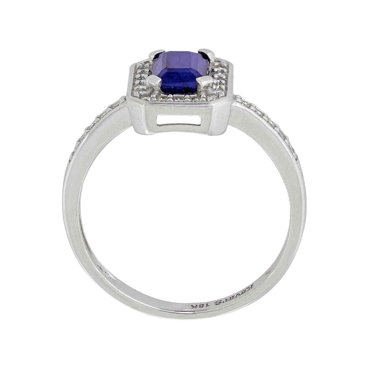 Anillo en oro blanco de 18 Kilates, con zafiro central de 0.60 Ct y decoración en diamantes de 0.15 Ct