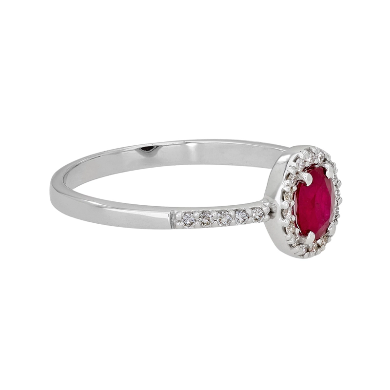 Anillo en oro blanco de 18 Kilates, con rubí central de 0.47 Ct y decoración en diamantes de 0.14 Ct