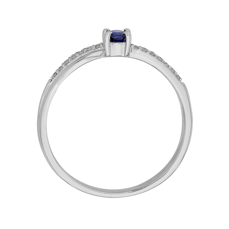 Anillo en oro blanco de 18 Kilates, con zafiro central de 0.23 Ct y decoración en diamantes de 0.08 Ct