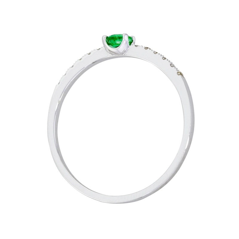 Anillo en oro blanco de 18 Kilates, con esmeralda central de 0.15 Ct y decoración en diamantes de 0.06 Ct