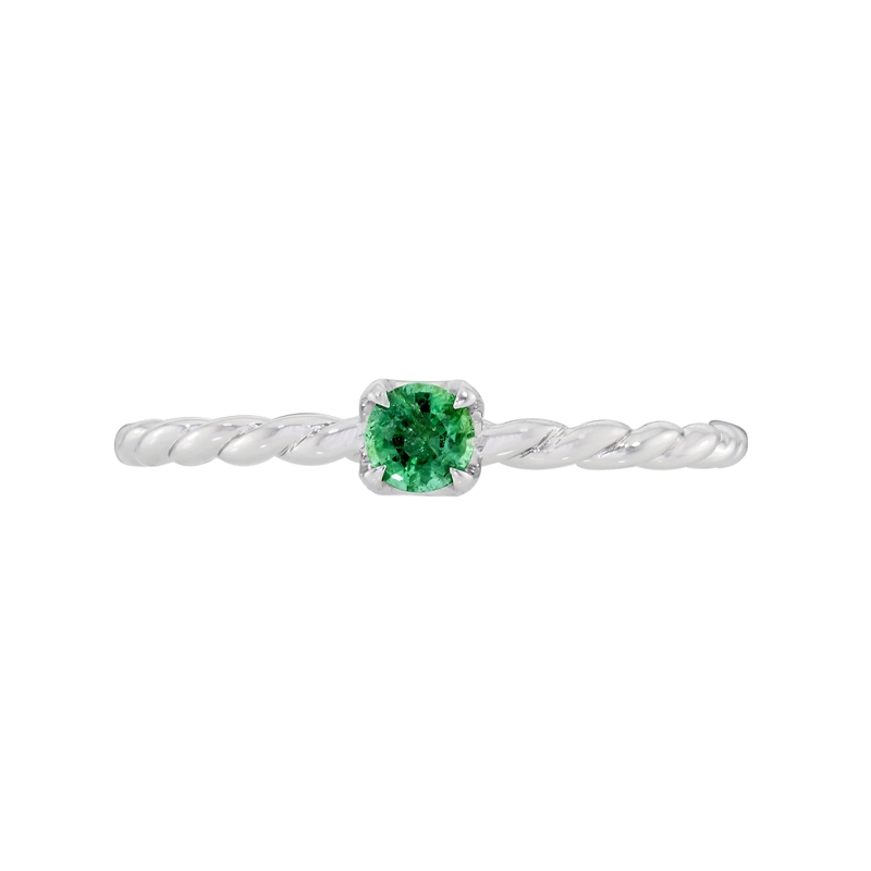 Anillo en oro blanco de 18 Kilates, con esmeralda central de 0.15 Ct