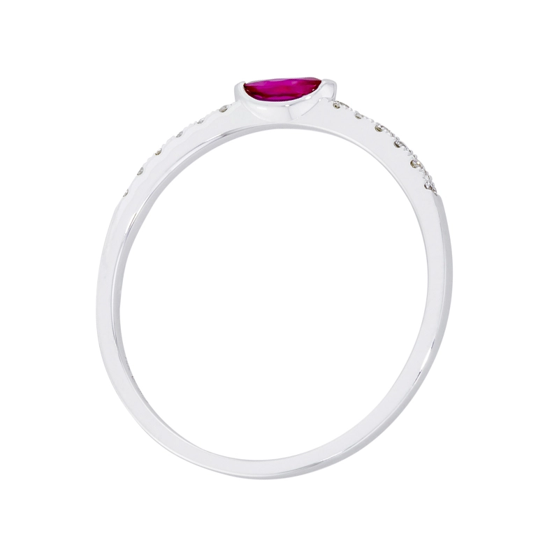 Anillo en oro blanco de 18 Kilates, con rubí central de 0.15 Ct y decoración en diamantes de 0.06 Ct