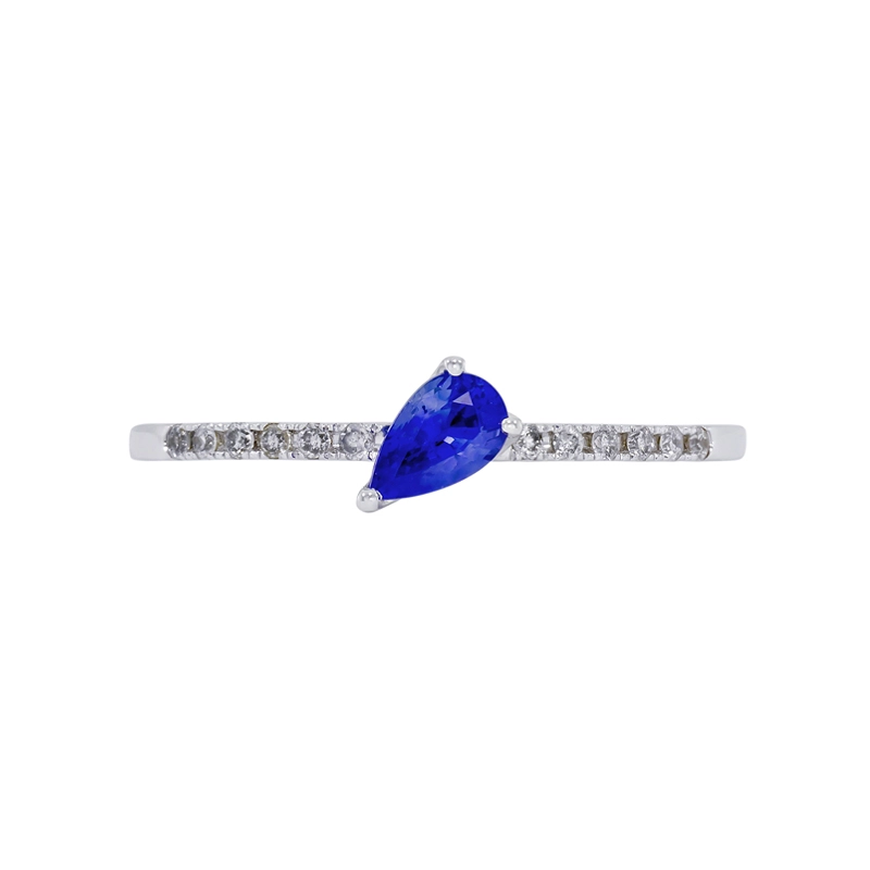 Anillo en oro blanco de 18 Kilates, con zafiro central de 0.25 Ct y decoración en diamantes de 0.06 Ct