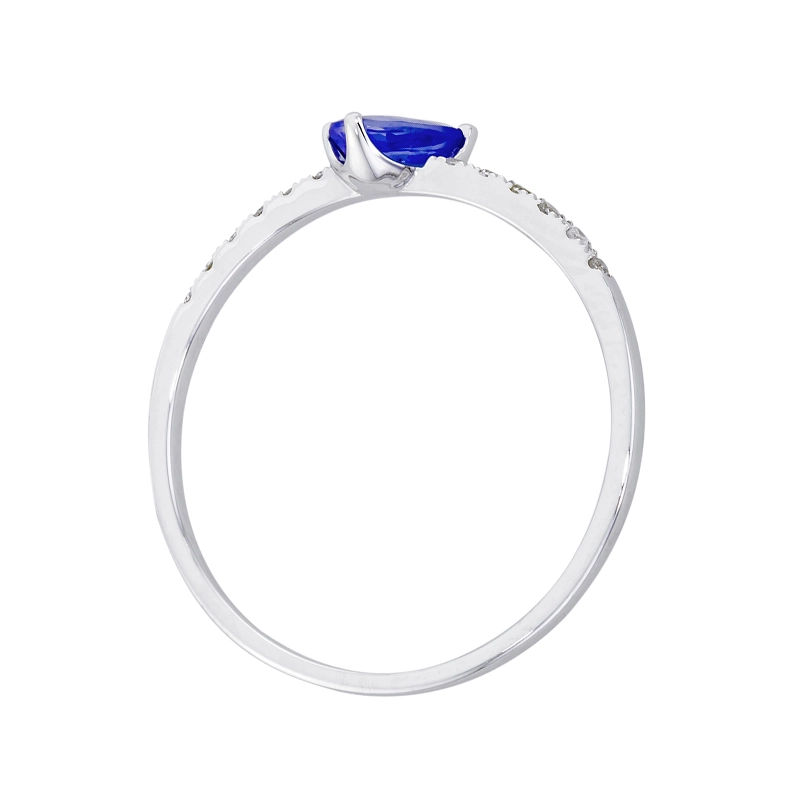 Anillo en oro blanco de 18 Kilates, con zafiro central de 0.25 Ct y decoración en diamantes de 0.06 Ct