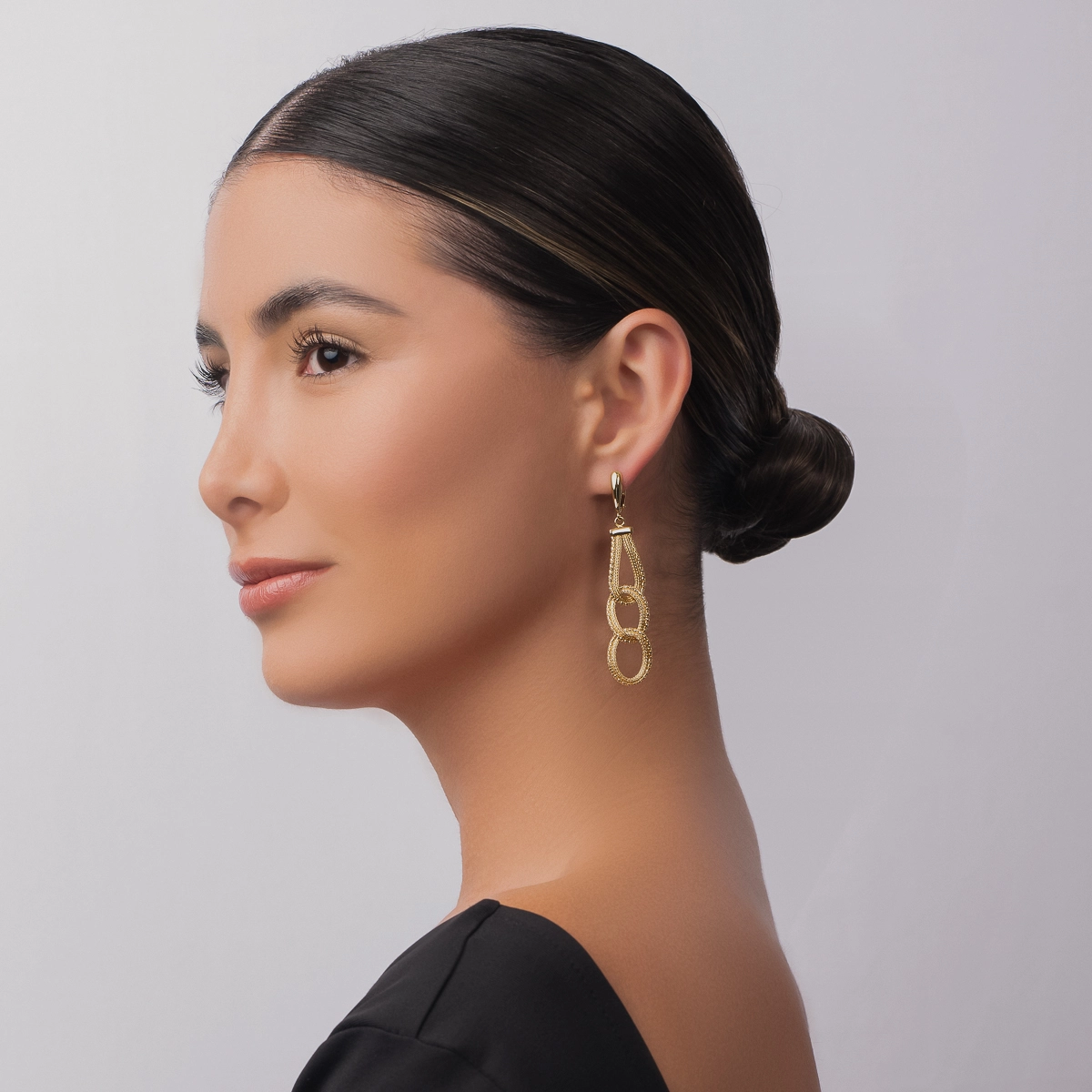 Aretes en oro amarillo de 18 Kilates con visos
