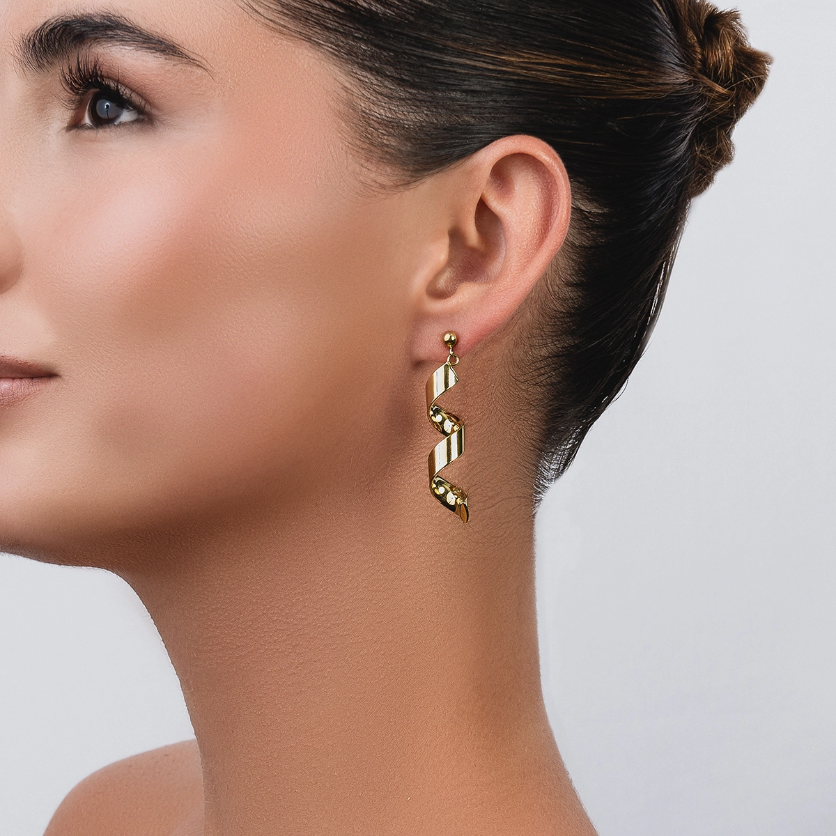 Aretes en oro amarillo de 18 Kilates, Espiral