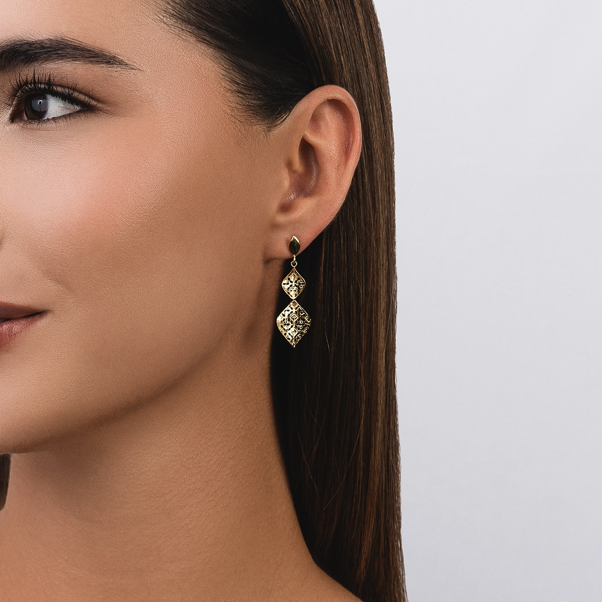 Aretes en oro amarillo de 18 Kilates con visos satinado, Figuras geométricas