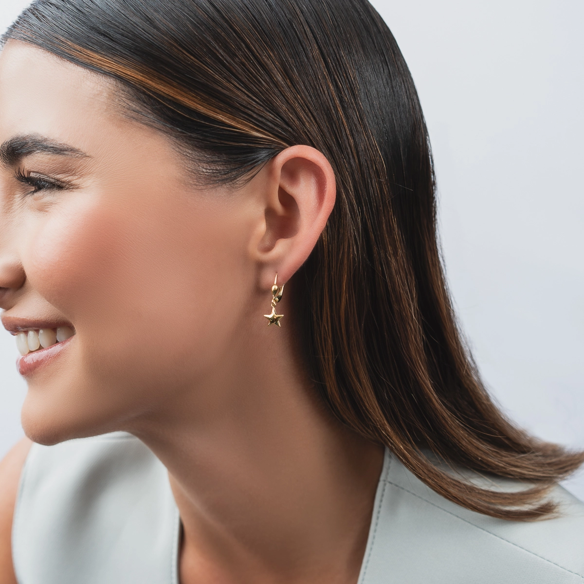 Aretes en oro amarillo de 18 Kilates, Estrella