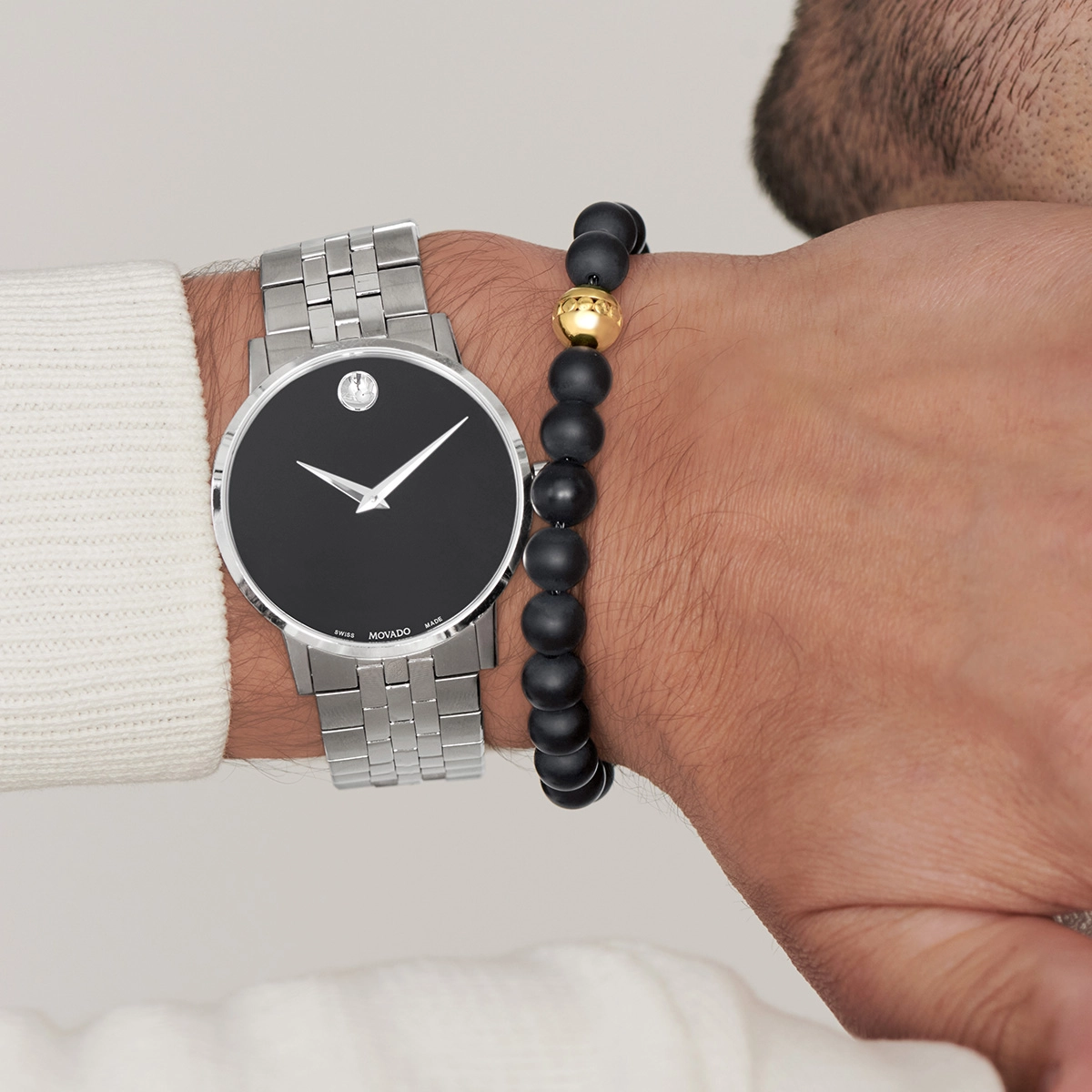 Reloj Movado análogo, para Hombre, tablero redondo colores negro y plateado, estilo sin números, pulso acero color plateado