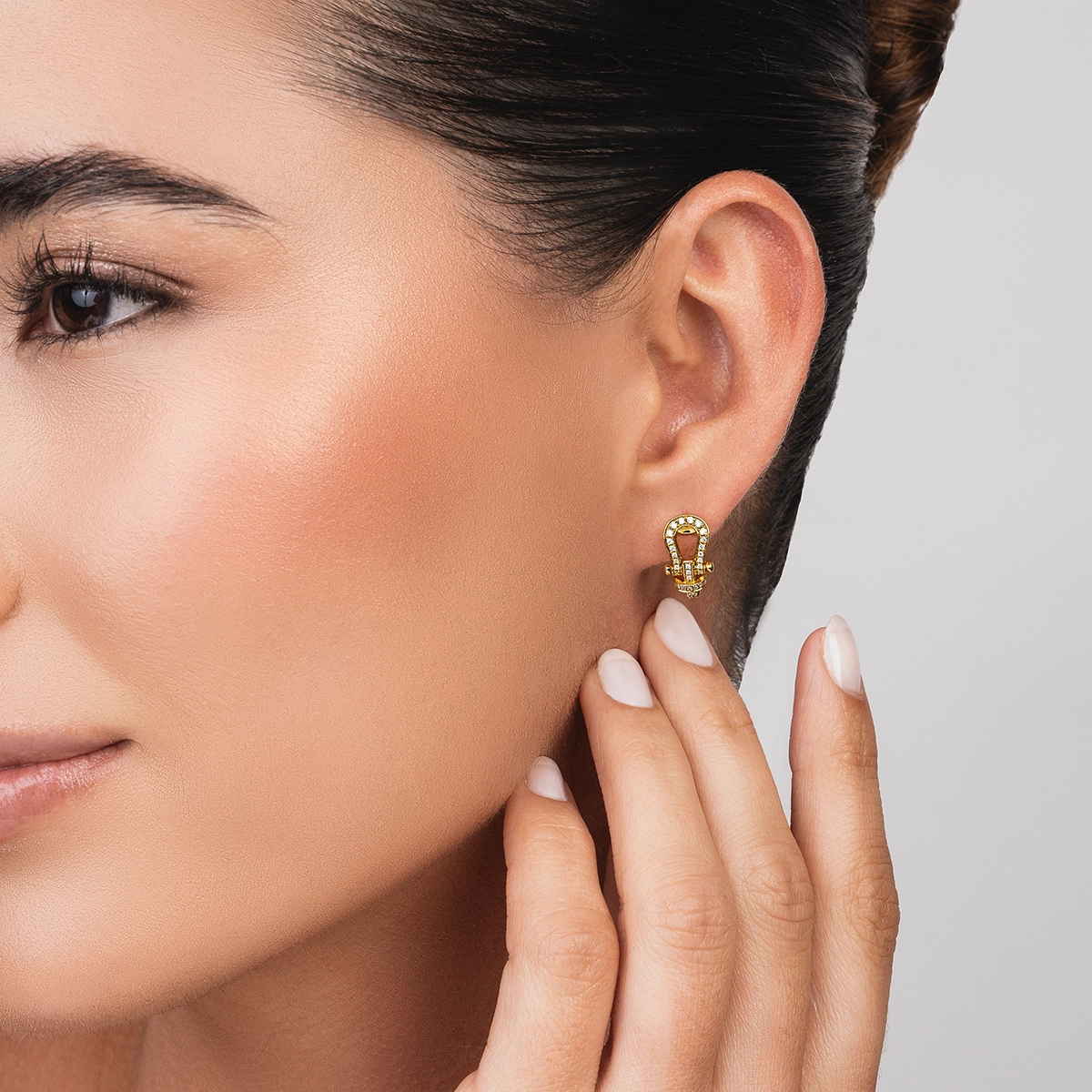 Candongas en oro amarillo de 18 Kilates, con diamantes de 0.28 Ct