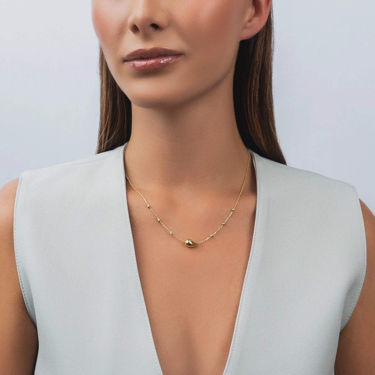 Gargantilla en oro amarillo de 18 Kilates con visos, Gota, 42 cm. de largo, 0.50 mm. de ancho