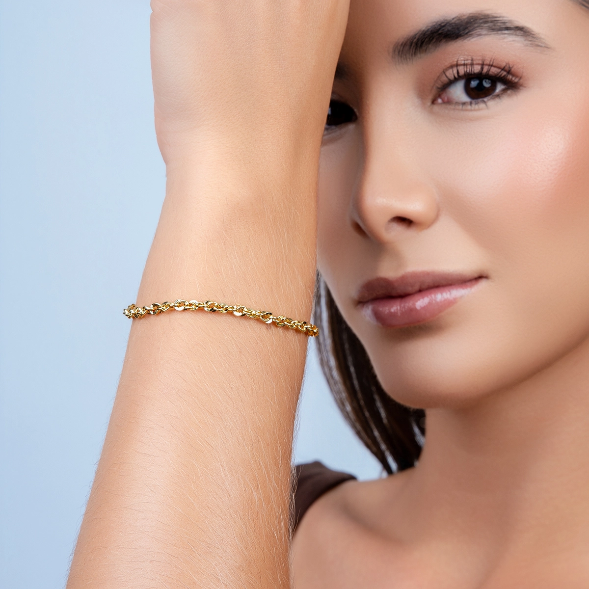 Pulsera en oro amarillo de 18 Kilates con visos, 19 cm. de largo, 3.50 mm. de ancho