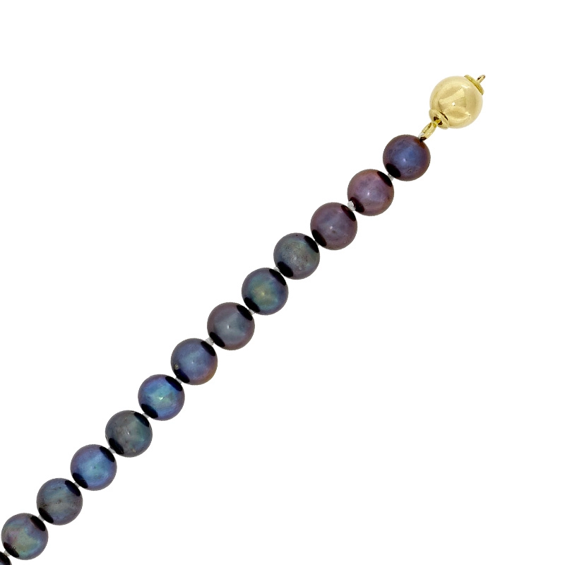 Pulsera con perlas de 6 mm de ancho aprox con broche en oro amarillo de 18 Kilates, 19 cm. de largo