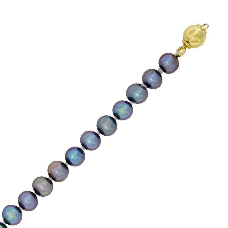 Pulsera con perlas de 5 mm de ancho aprox con broche en oro amarillo de 18 Kilates, 19 cm. de largo