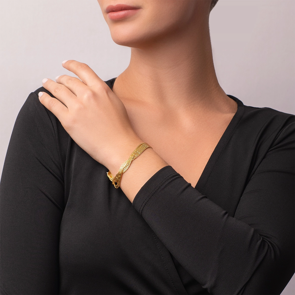 Pulsera en oro amarillo de 18 Kilates, 19 cm. de largo, 9 mm. de ancho