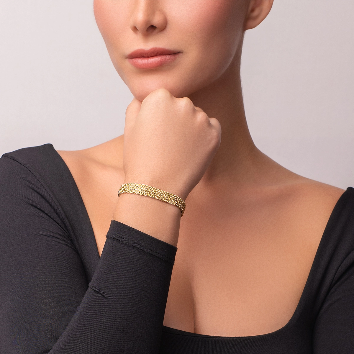 Pulsera en oro amarillo de 18 Kilates, 18 cm. de largo, 9 mm. de ancho