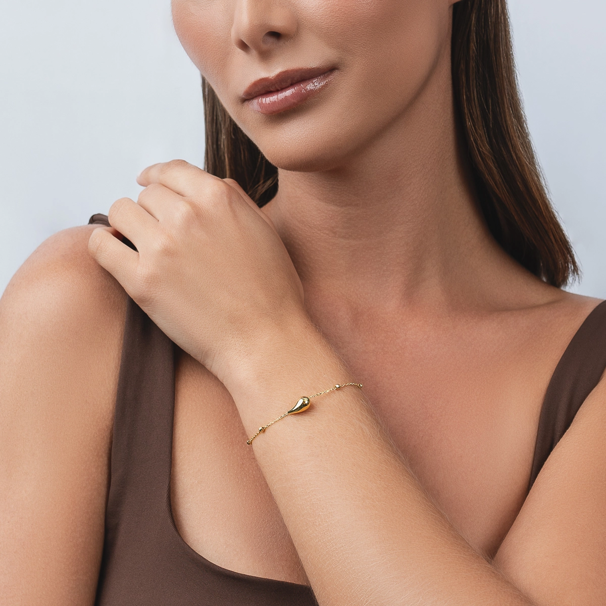 Pulsera en oro amarillo de 18 Kilates con visos, 17 cm. de largo, 1 mm. de ancho
