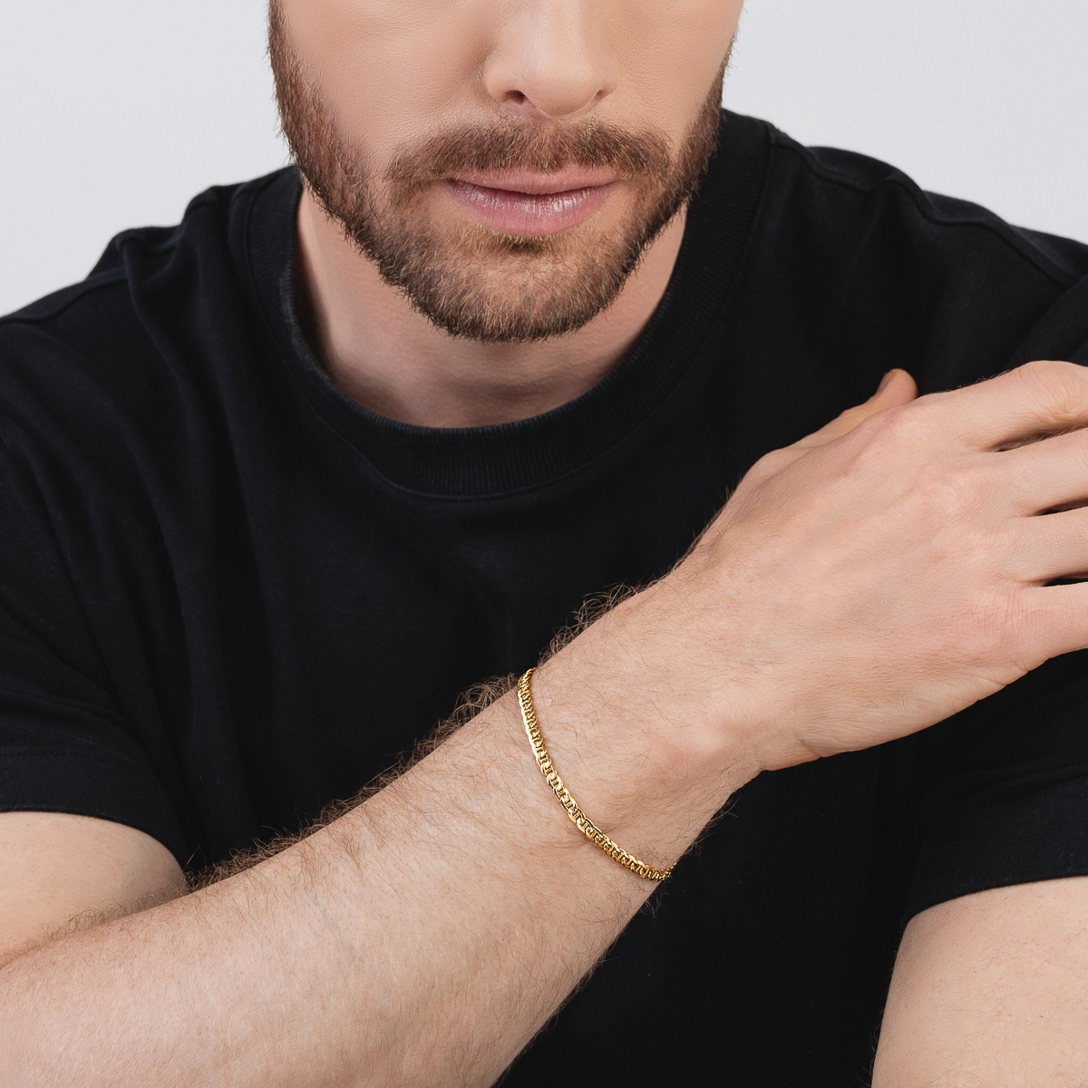 Pulsera en oro amarillo de 18 Kilates, con zircón central, 21 cm. de largo, 3.50 mm. de ancho