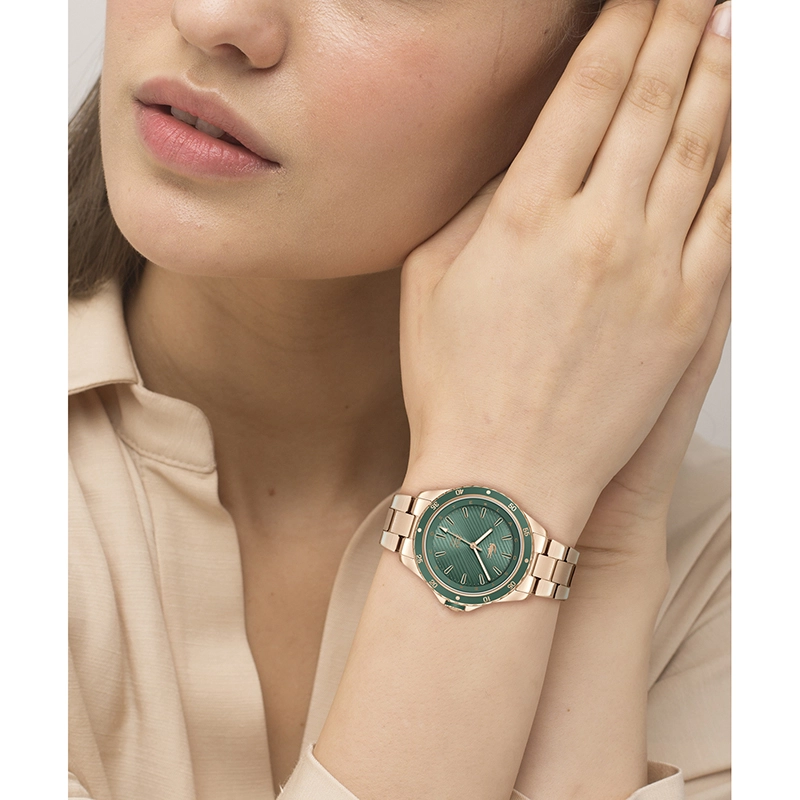 Reloj Lacoste analogo, para Dama, tablero redondo colores verde y rosa, estilo index, pulso acero color rosa
