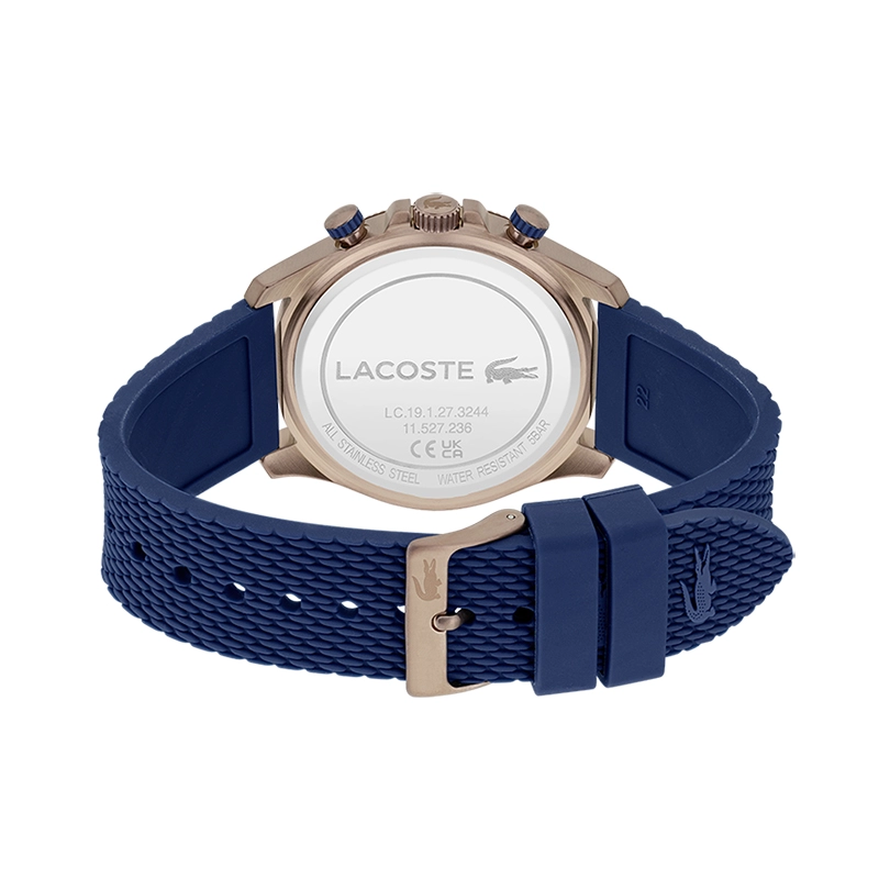 Reloj Lacoste analogo, para Hombre, tablero redondo colores azul y rosa, estilo index, pulso silicona color azul, cronografo