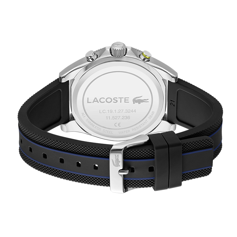 Reloj Lacoste analogo, para Hombre, tablero redondo colores azul y dorado, estilo index, pulso silicona colores negro y azul, calendario, cronografo
