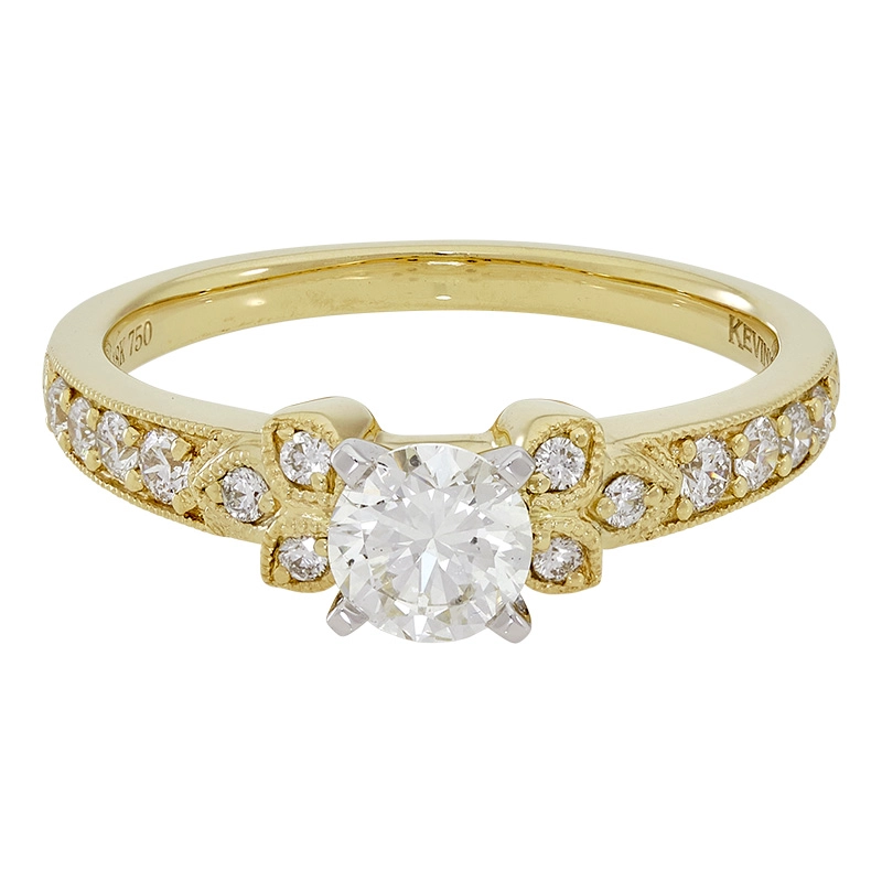 Anillo de compromiso con diamante central redondo GIA de 0.50ct y decoración en diamantes, oro 2 tonos 18k