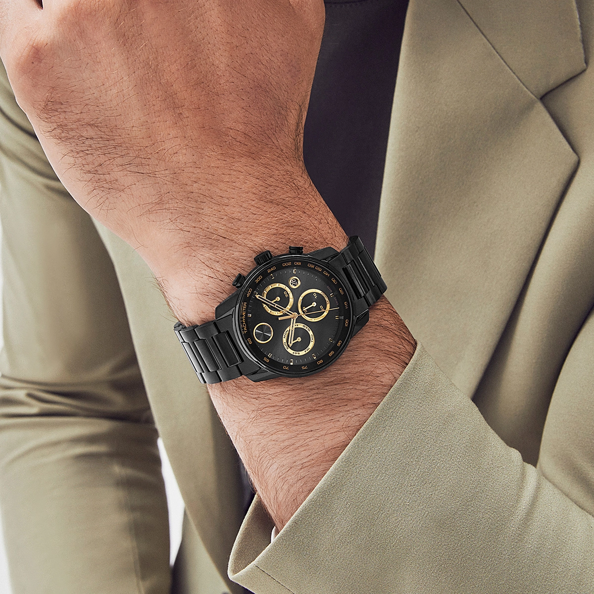 Reloj Movado análogo, para Hombre, tablero redondo colores negro y dorado, estilo index, pulso acero color negro, calendario, cronografo