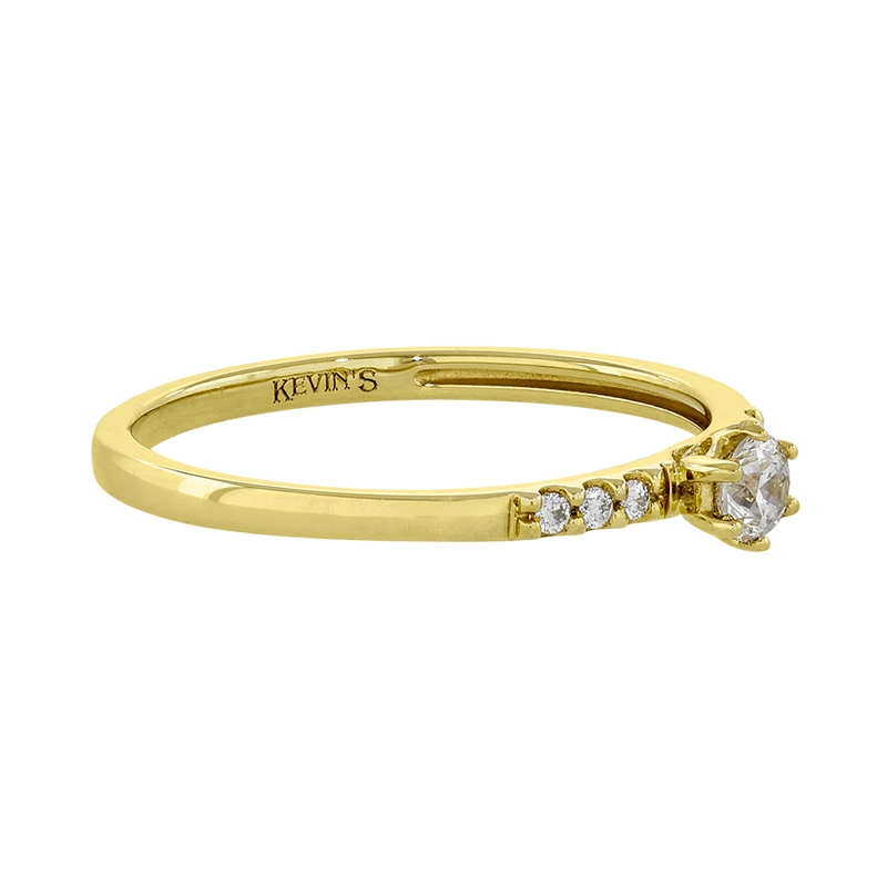 Anillo de compromiso con diamante central redondo de 0.12ct y decoración en diamantes, oro tono amarillo 18k