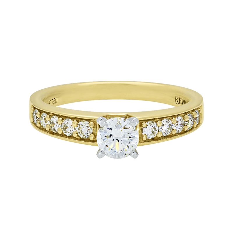 Anillo de compromiso con diamante central redondo GIA de 0.33ct y decoración en diamantes, oro 2 tonos 18k, rodinado
