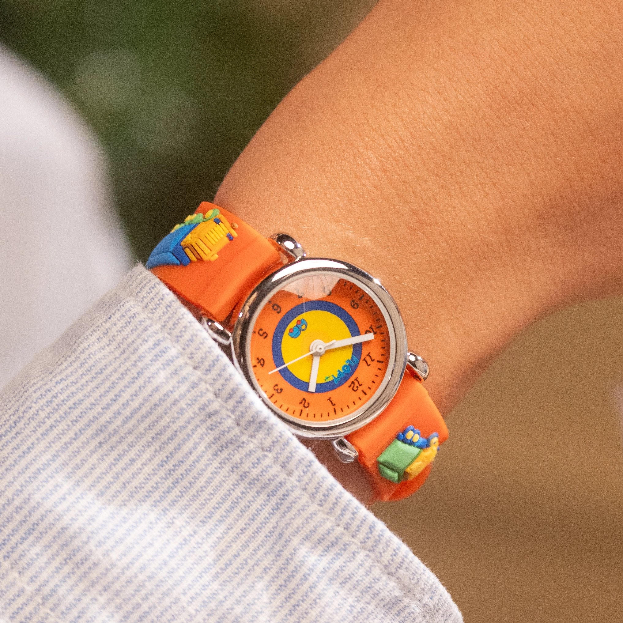 Reloj Flopy analogo, para Niño(a), tablero redondo color naranja, estilo arabigos, pulso plastico color naranja