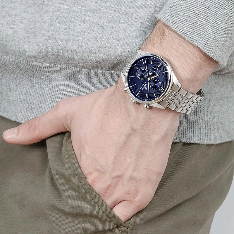 Reloj Festina análogo, para Hombre, tablero redondo color azul, estilo index + arábigo, pulso acero color plateado, cronografo