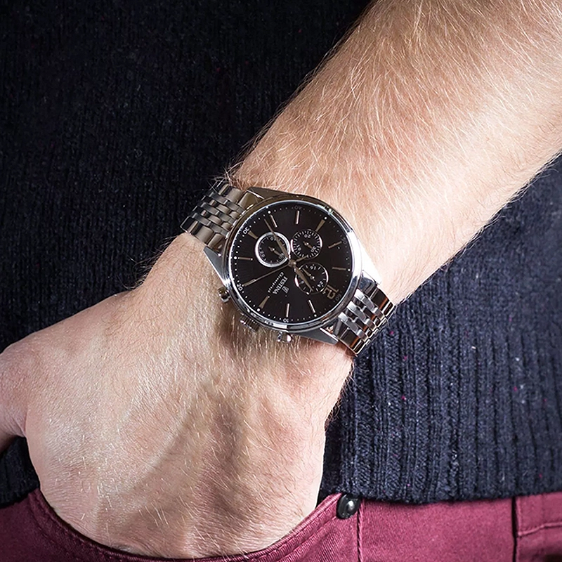 Reloj Festina análogo, para Hombre, tablero redondo color negro, estilo index + arábigo, pulso acero color plateado, cronografo