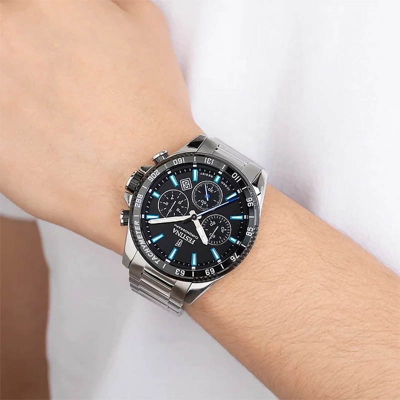 Reloj Festina análogo, para Hombre, tablero redondo color negro, estilo index, pulso acero color plateado, calendario, cronografo