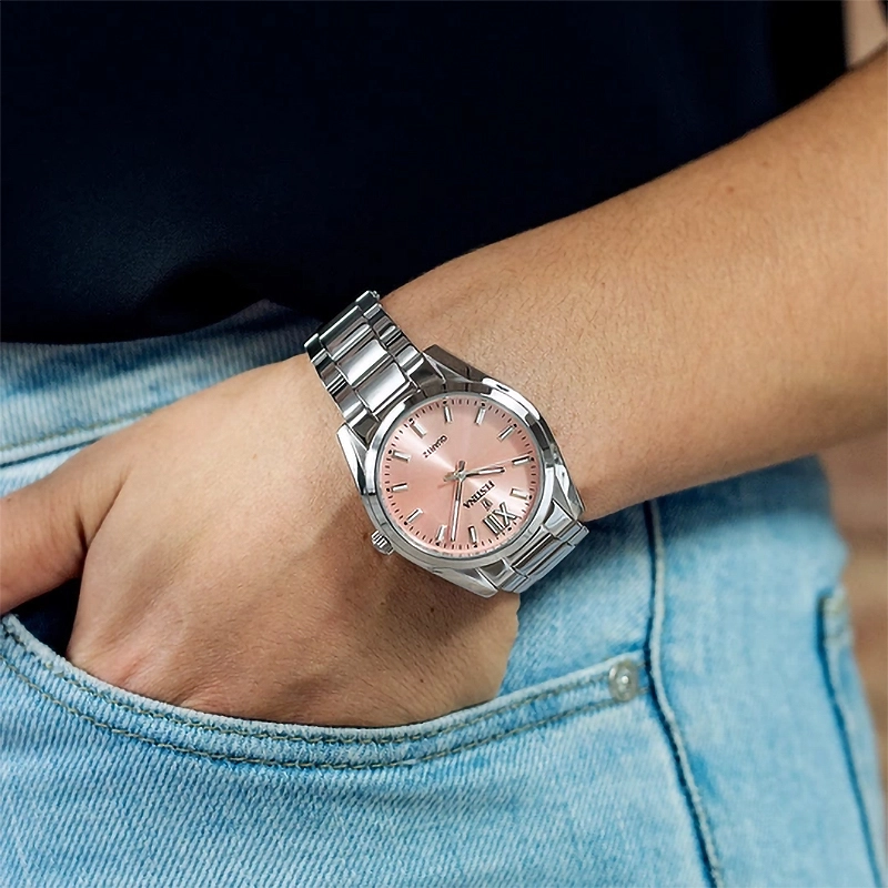 Reloj Festina análogo, para Dama, tablero redondo color rosado, estilo index + romano, pulso acero color plateado