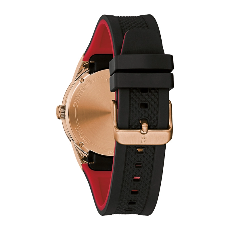 Reloj Bulova analogo, para Hombre, tablero redondo colores negro y rosa, estilo index, pulso silicona colores negro y rojo, calendario
