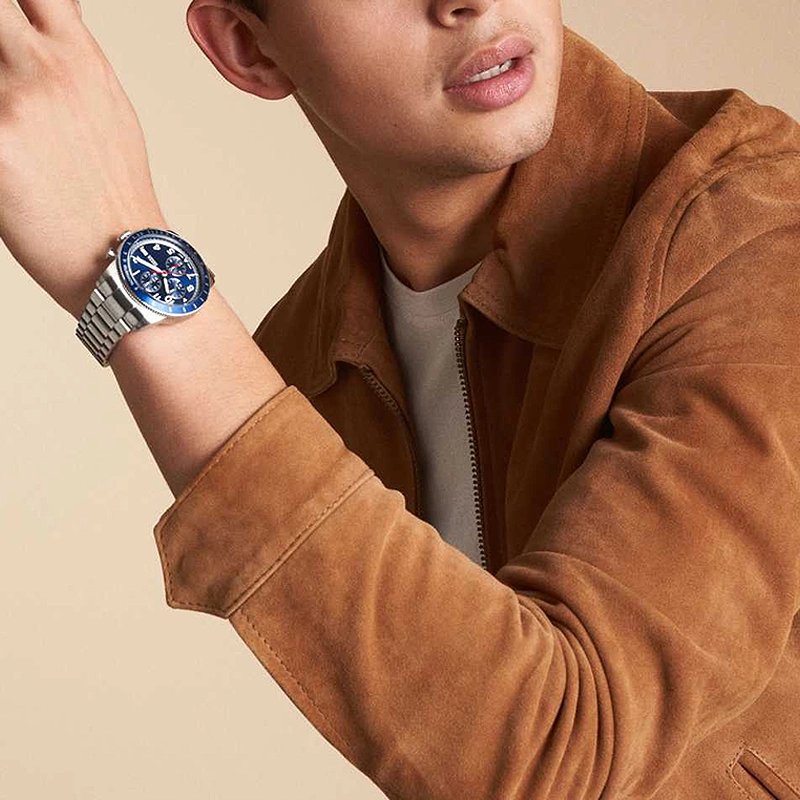 Reloj Fossil analogo, para Hombre, tablero redondo color azul, estilo arabigos, pulso acero color plateado, calendario, cronografo