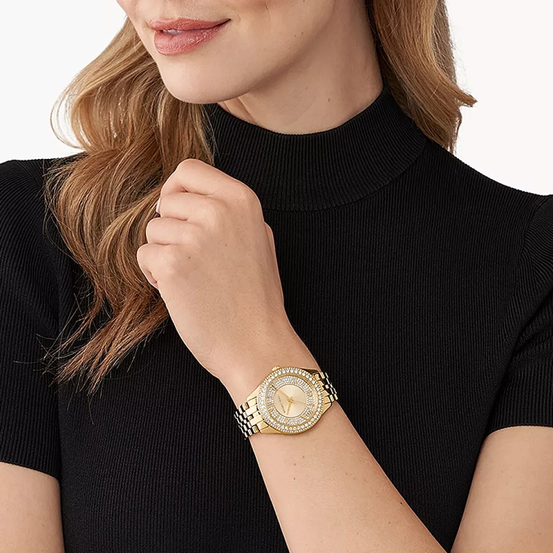 Reloj Mkors análogo, para Dama, tablero redondo color dorado, estilo index + romano, pulso acero color dorado